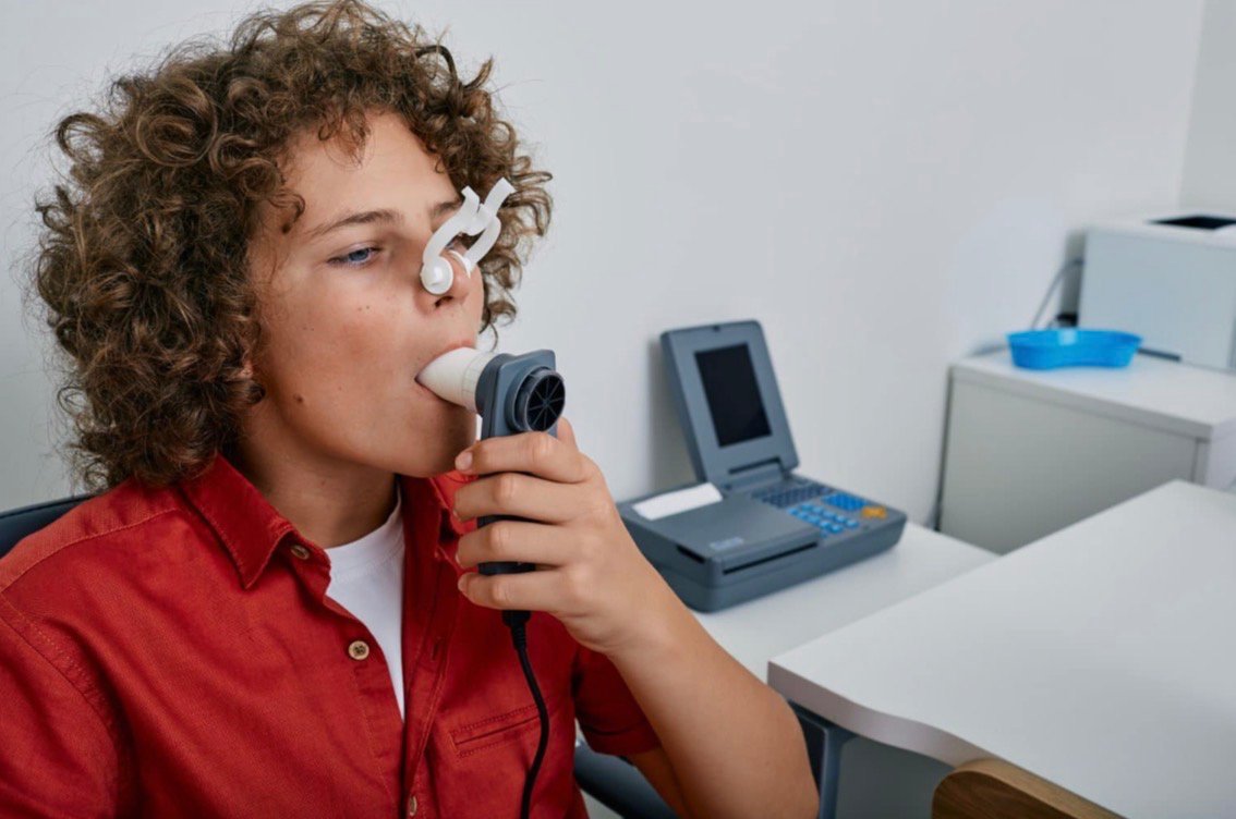 Espirometria — paciente realizando exame de função pulmonar